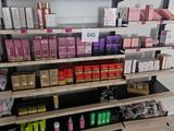 a large display of cosmetics products in a store