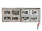an open book with pictures of people and animals on it