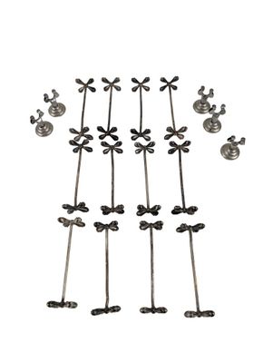 set of six metal crosses on a white background with a white background