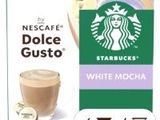 un gros plan sur une boîte de café avec une tasse de café