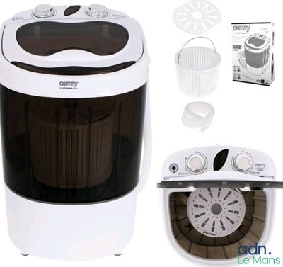 an image of a small washing machine with a basket