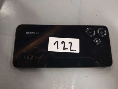 a black phone with a number on the back of it