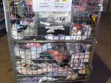 a cart with a lot of shoes in it