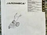 a close up of a manual for a lawn mower on a table