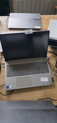 two laptops that are sitting on a table
