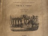 un vieux livre avec l'image d'un homme sur un cheval