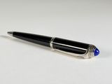 an image of a pen on a white surface