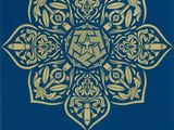 a blue and gold book with a medallion design on it