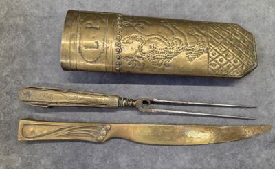 a knife, knife sharper, and a knife on a table