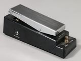 an electric guitar pedal sitting on top of a black box