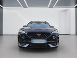 the front view of a black car in a white room