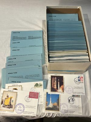 a box with a lot of postcards on a table