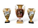 three vases sitting on top of each other on a white surface