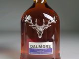 a bottle of dalmore whisky with a deer head on it