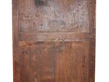 a wooden cabinet with a drawer on top of it