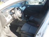 a picture of the interior of a car with the door open