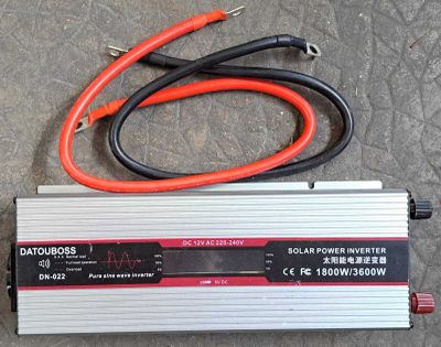 an image of a power invertor sitting on the ground