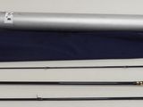 an image of a fishing rod, reel, and other fishing gear