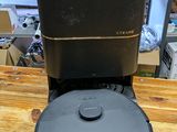 an image of a coffee maker sitting on top of a wooden table