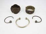 a collection of silver bracelets and bangles