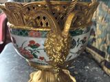 a vase that is sitting on a table in a room