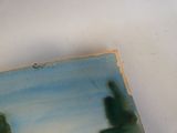 une photo d'un tableau sur un fond blanc