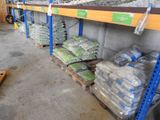 many bags of food on the shelves in the store