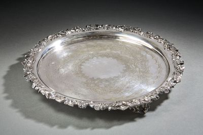a silver plate that is sitting on a table