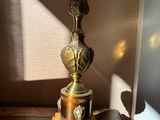 a lamp that is sitting on a table in a room