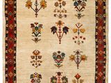 a white rug with a floral design on it