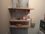 a small kitchen with a sink and a microwave in it