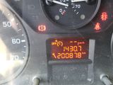a close up of a speedometer on a car ' s dashboard