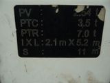 a black and white sign on the side of a white refrigerator