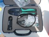 a tool set up in a case on a table