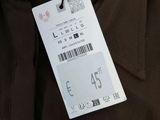 an image of a brown coat with a tag attached to it