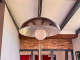 a light that is hanging from the ceiling in the room
