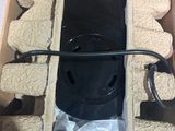 a cardboard box with a black object inside of it