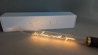a white box with a light that says i love you next to it