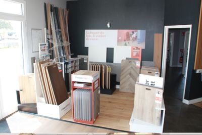 a picture of a room with a lot of wood flooring