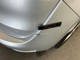 a close up of a car with a sticker on it