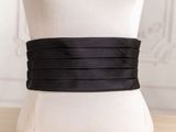a close up of a mannequin torso with a black belt