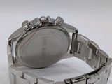 an image of a close up of a wrist watch on a white surface