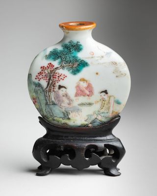 an image of a vase with a painting on it on a stand