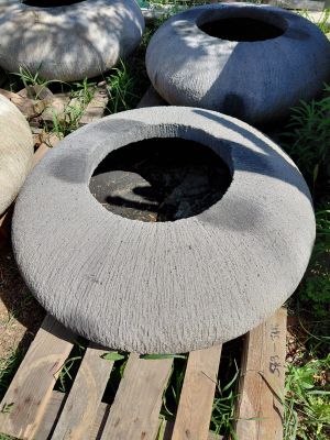 a pile of tires that are sitting on the ground