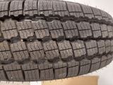 a close up of a tire on display in a store