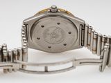 an image of a close up of a wrist watch on a white surface