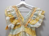 an image of a dress hanging on a hanger