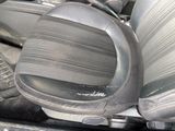 an image of a car seat with a seat belt in it
