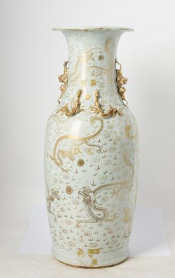 a vase that is sitting on a white surface