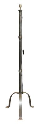 a metal pole with a light on top of it